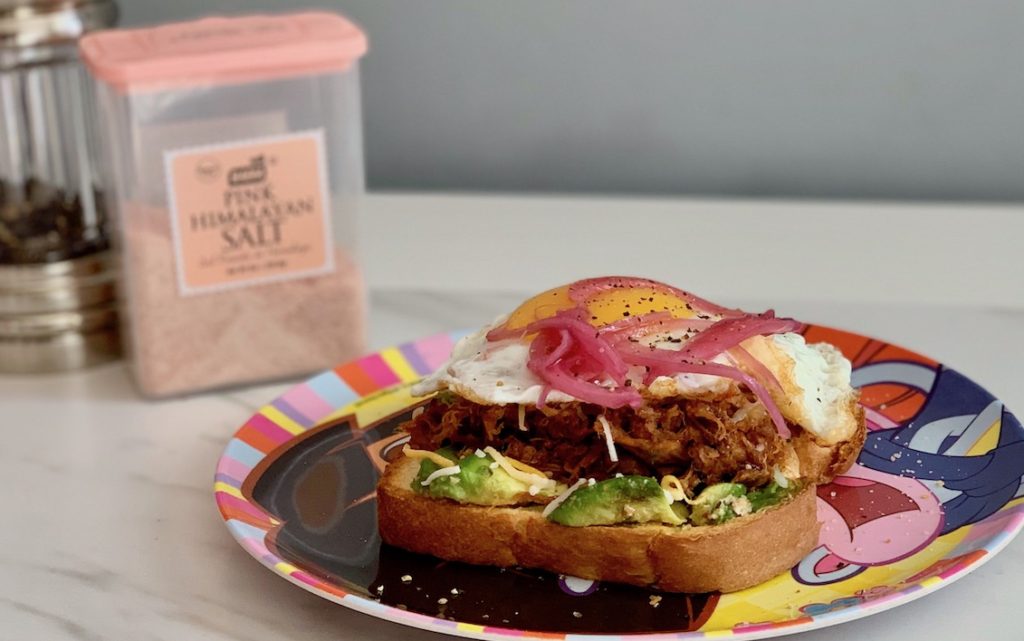 Avocado, egg and pulled pork sandwich